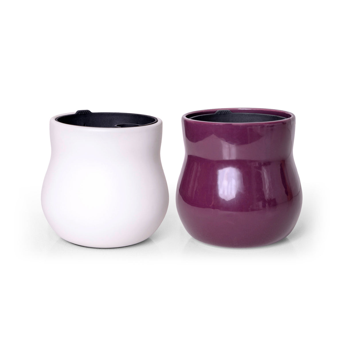 Two handmade ceramic plant pots, Alabaster White and Violet Purple