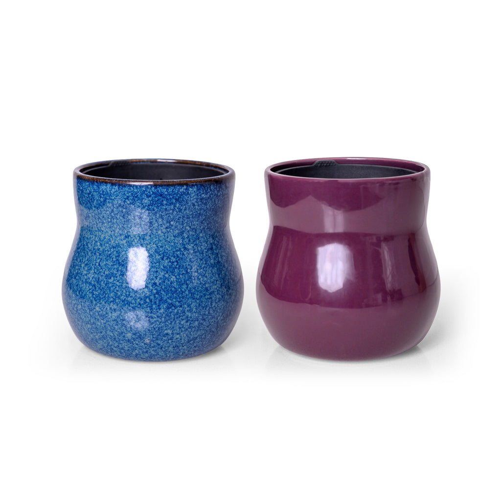 Two handmade ceramic plant pots, River Blue and Violet Purple