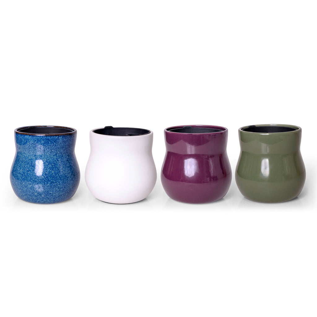 Four handmade ceramic plant pots in River Blue, Alabaster White, Violet Purple and Forest Green