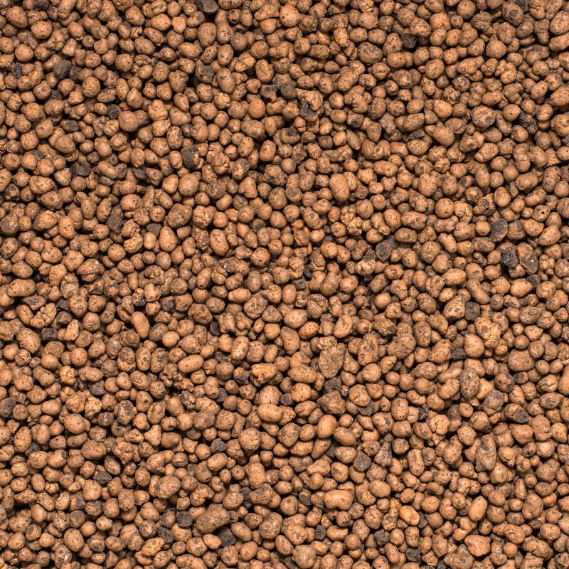 A close-up image of expanded clay pebbles, highlighting their porous texture and lightweight properties ideal for hydroponics and soil aeration.