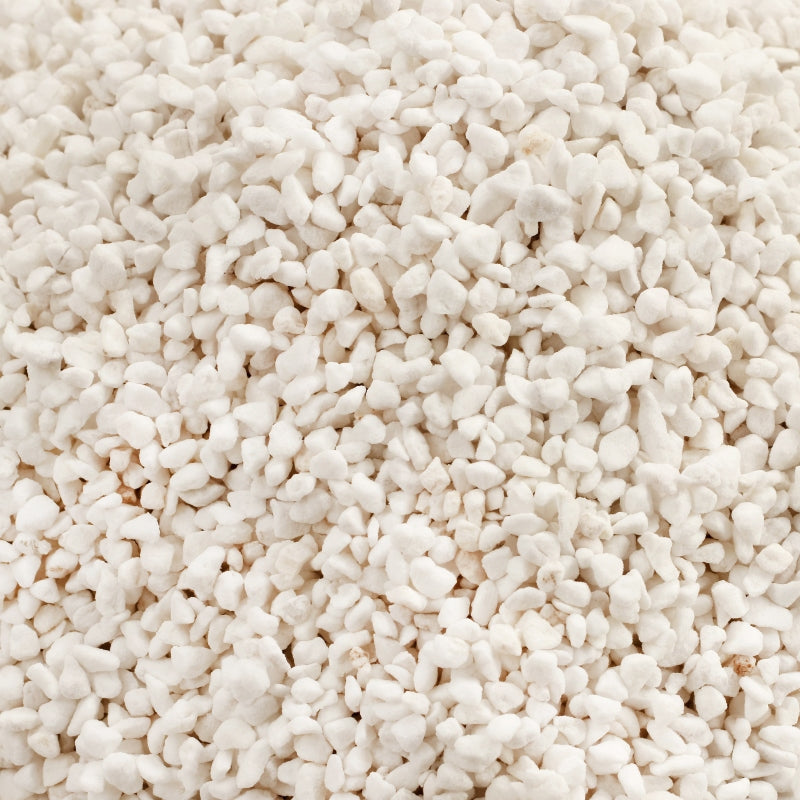 Close-up of white, porous perlite granules.